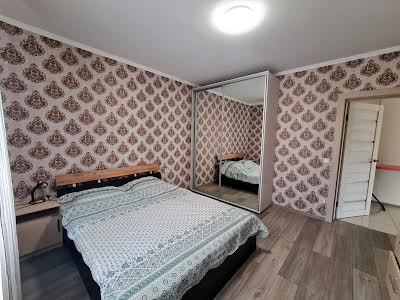 будинок за адресою смт. Таїрове, Коралова вул.