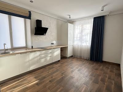 комерційна за адресою Подільська вул., 54/1