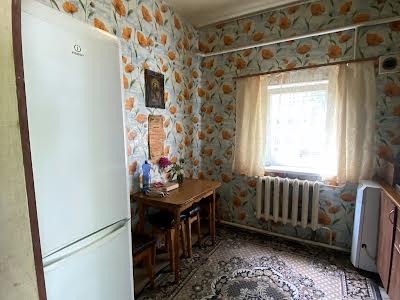 будинок за адресою Комарова вул., 25