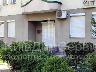 комерційна за адресою Дмитрівська вул., 52б