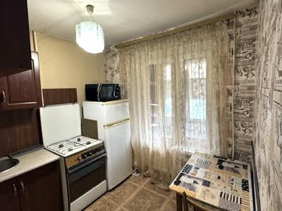 квартира по адресу Строителей ул., 12