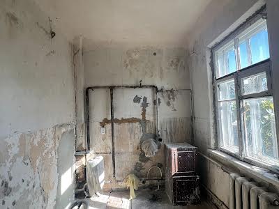 будинок за адресою Родини Кричевських вул. (Шапошникова), 38