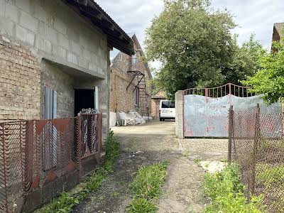 будинок за адресою Комарова вул., 25