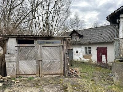 дом по адресу пгт. Богородчаны, Лесі Українки