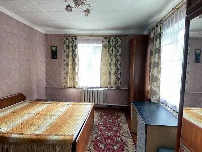 будинок за адресою Комарова вул., 25