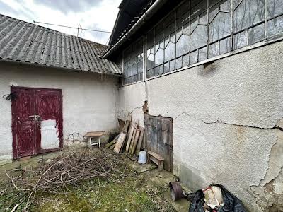 дом по адресу пгт. Богородчаны, Лесі Українки