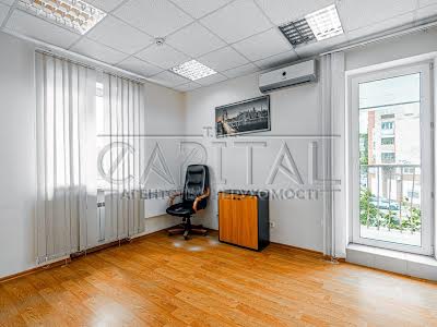 комерційна за адресою Оболонська вул., 21