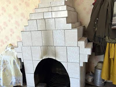 дом по адресу с. Пороскотень, Квіткова