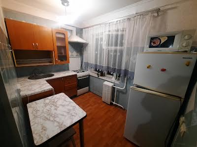 квартира за адресою Ігоря Качуровського пров. (Миколи Руднєва), 1-А