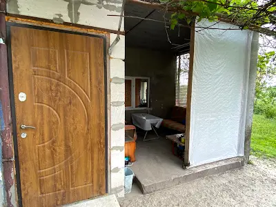 дом по адресу провулок Миру, 8а