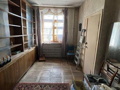 квартира за адресою Куликівський узвіз (Революції), 8/10