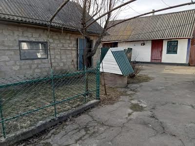 дом по адресу с. Валки, Жовтнева