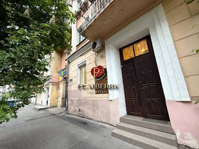 комерційна за адресою Волоська вул., 24а