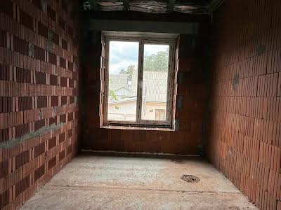 будинок за адресою Сім'ї Шкарівських вул., 12