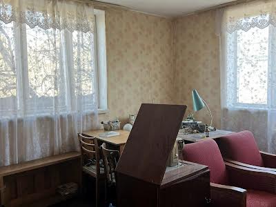 дом по адресу с. Пороскотень, Квіткова