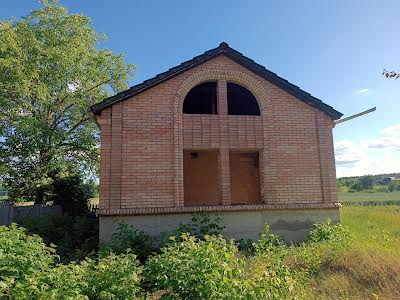 будинок за адресою с. Томилівка, Центральна