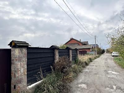 будинок за адресою с. Нові Петрівці, Канівська вул.