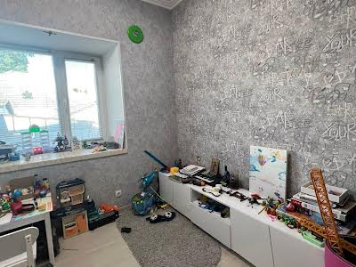 будинок за адресою Євгена Коновальця вул. (Гліба Успенського), 45