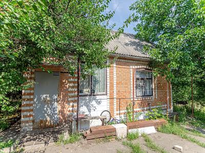 дом по адресу с. Старицковка, Центральная, 1
