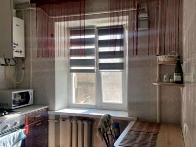 квартира за адресою Романа Кармена, 10
