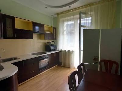 квартира за адресою Євгена Коновальця вул. (Щорса), 32-Б