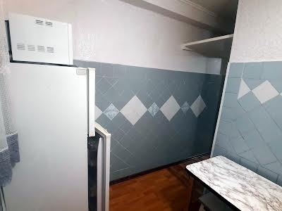 квартира за адресою Ігоря Качуровського пров. (Миколи Руднєва), 1-А