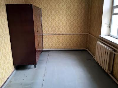 дом по адресу Каменское (Днепродзержинск), Димитровский рынок, 1
