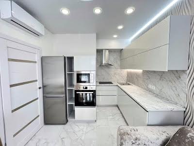 квартира за адресою Каманіна, 16-А