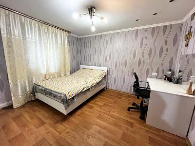 будинок за адресою Жовтнева, 75
