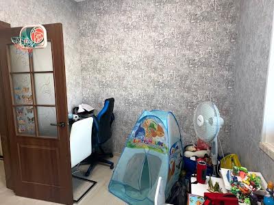 будинок за адресою Євгена Коновальця вул. (Гліба Успенського), 45