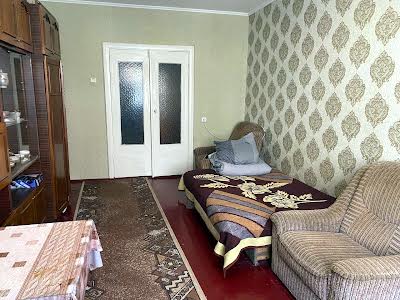 кімната за адресою Євгена Коновальця вул., 7