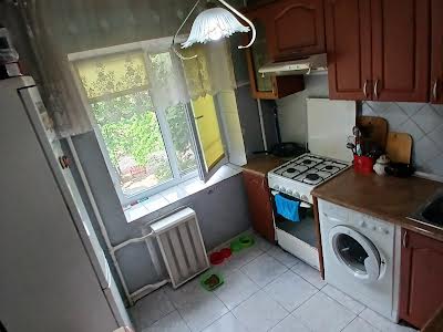 квартира за адресою Мілютенка вул., 15-А