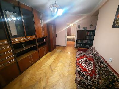 квартира за адресою Ігоря Качуровського пров. (Миколи Руднєва), 1-А