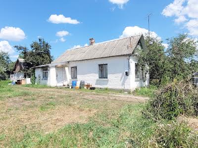 дом по адресу с. Тетеревка, Партизанська, 2