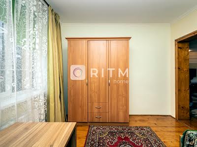будинок за адресою Євгена Коновальця вул., 287