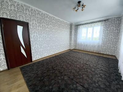 будинок за адресою с. Молодіжне, 22 лінія, 1