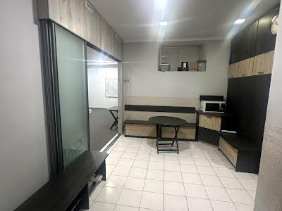комерційна за адресою Дмитра Донцова вул. (Котовського), 4