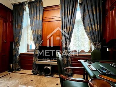 комерційна за адресою Володимирська вул., 49-А