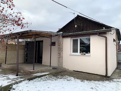 будинок за адресою Євгена Коновальця вул. (Гліба Успенського), 45