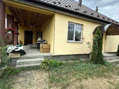 будинок за адресою с. Нові Безрадичі, Блакитна