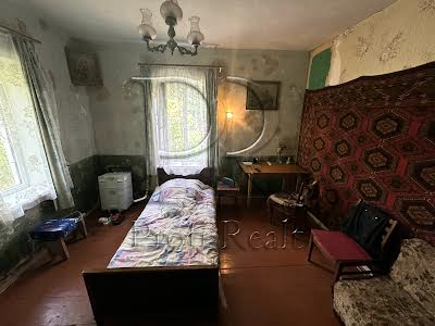 дом по адресу Каштанова вулиця, 1