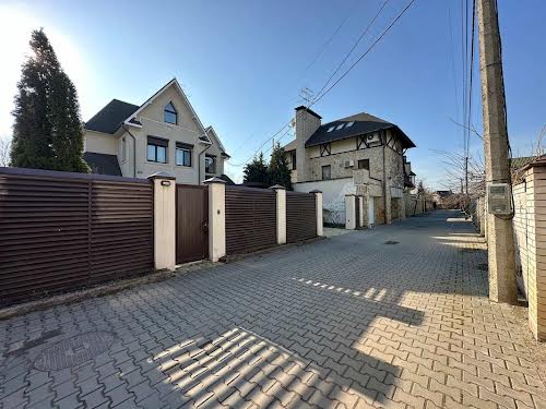 будинок за адресою Садова вул. 61-ая, 105