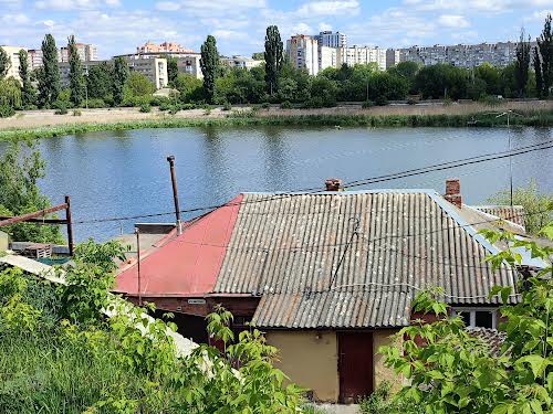 участок по адресу Набережна, 20