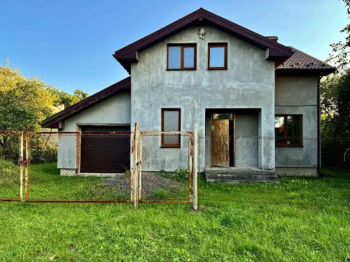 будинок за адресою с. Скнилів, Лесі Українки, 1