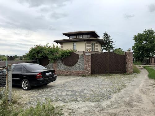 будинок за адресою с. Сінгури, Набережна