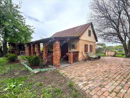 будинок за адресою с. Великі Сорочинці, Центральна, 1