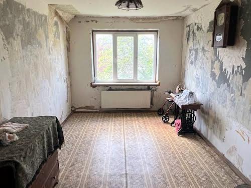 будинок за адресою Мілени Рудницької вул. (50-річчя Перемоги), 15