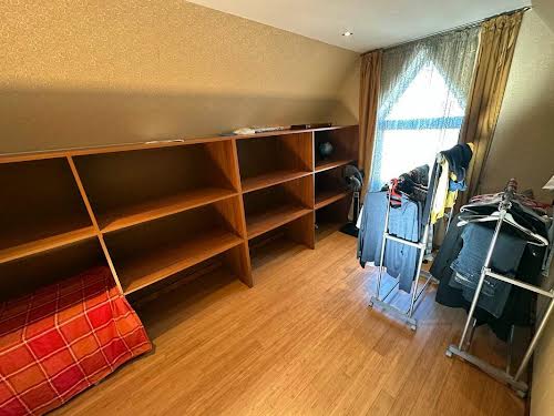будинок за адресою Садова вул. 61-ая, 105