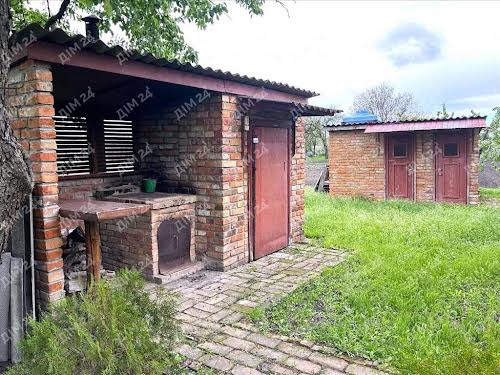 будинок за адресою с. Великі Сорочинці, Центральна, 1