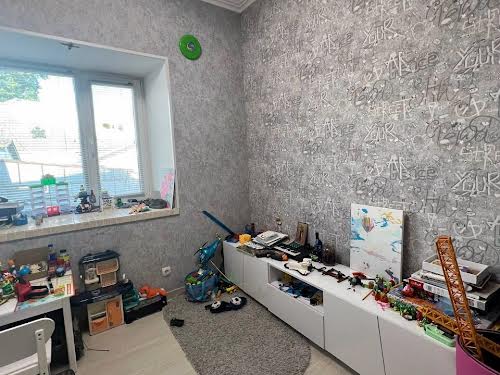 будинок за адресою Євгена Коновальця вул. (Гліба Успенського), 45